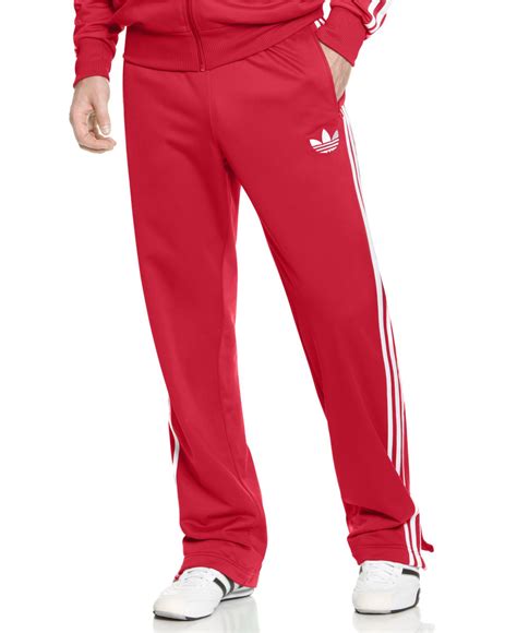 red Adidas track pants